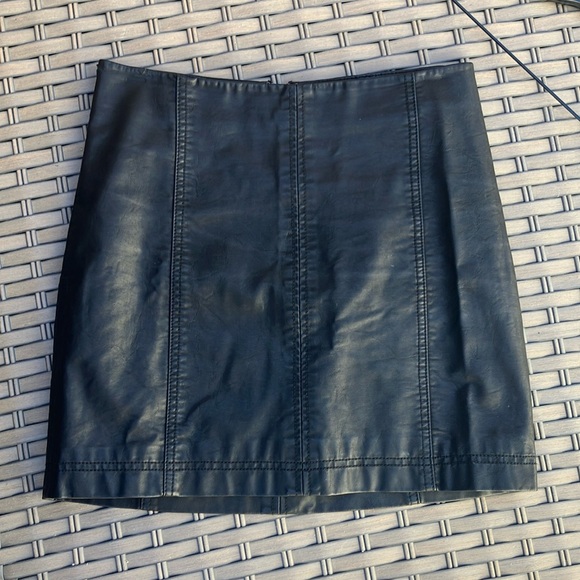 Free People faux leather mini skirt.  Fully lined.  Zips in the back.  Cute on! - Picture 1 of 9
